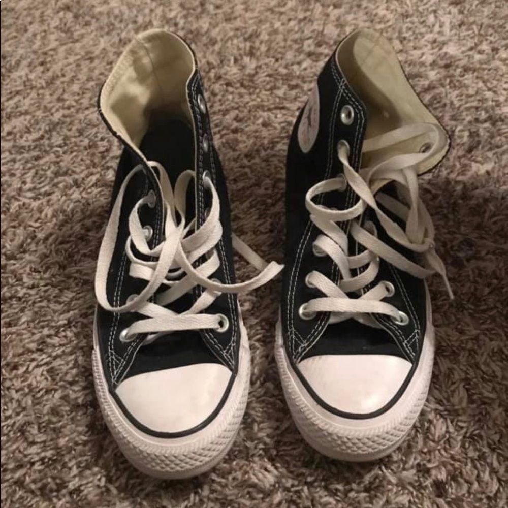 Black and white high top converses